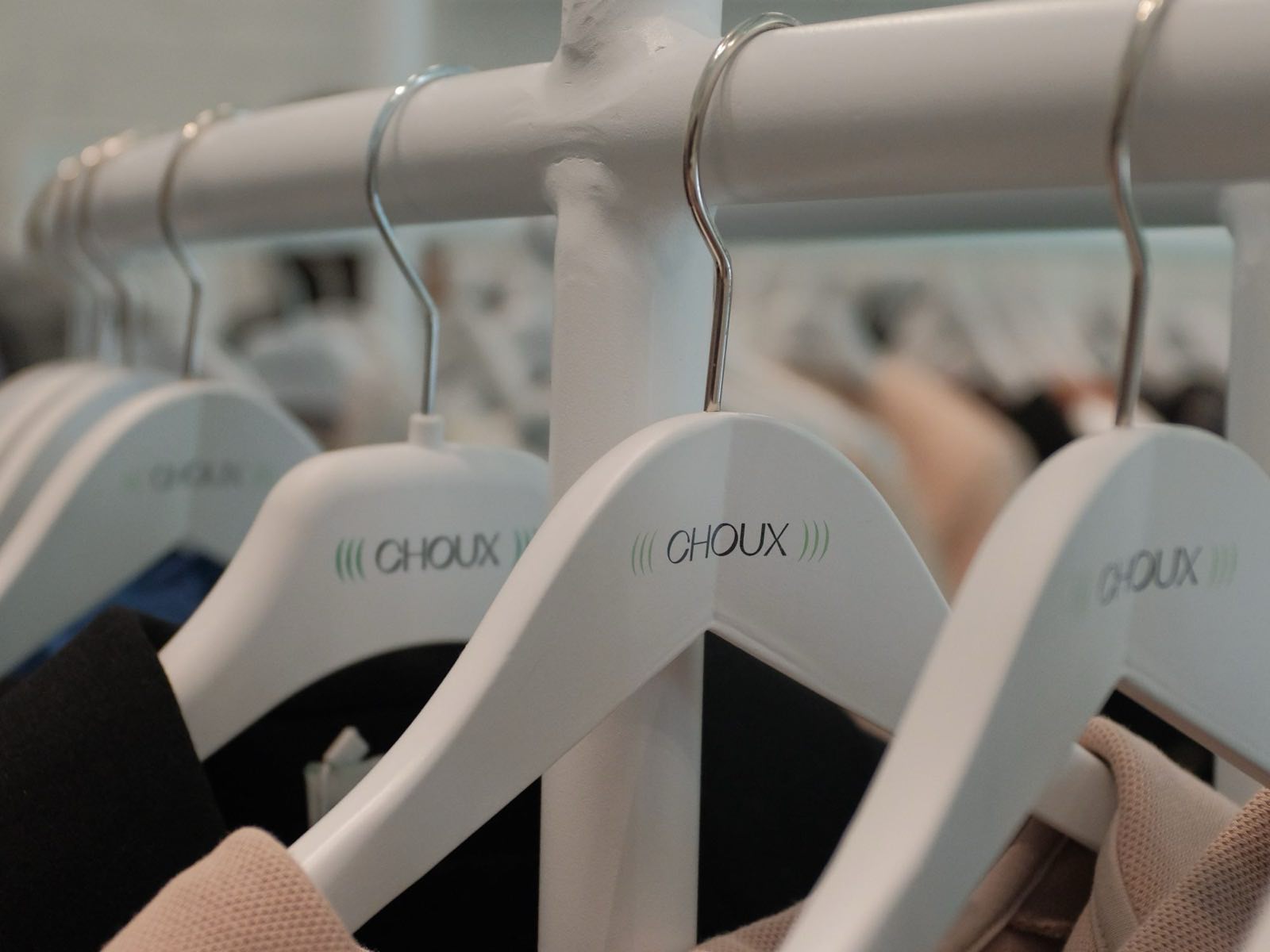 Garment hangers lined up ready for finished stock