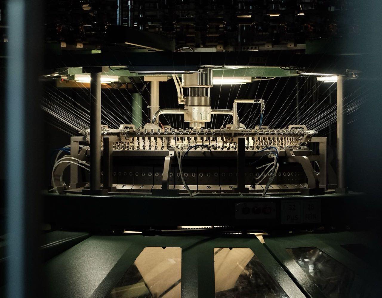 Industrial knitting machine running fabric