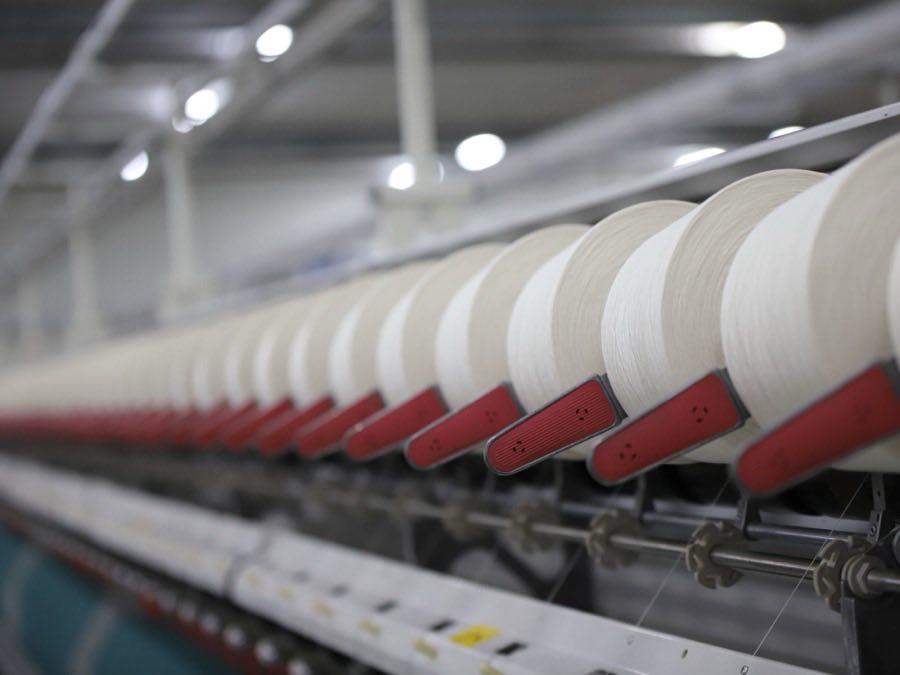 Close-up of an apparel production line in operation